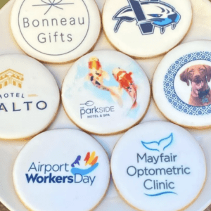 A plate of cookies with logos on them